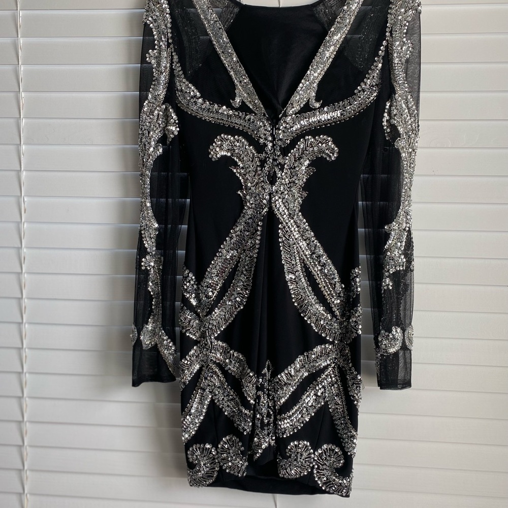 Claudine dress in size 0. Black with silver beads. V shaped back